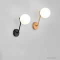 lumiart-moderne-wandleuchte-mit-glaskugel-lampe-schwarz-xlumina