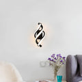lumispiral-zeitgenossische-led-Wandleuchte-spiral-design-modern-warmweiss-schwarz-gold-12w-xlumina