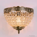 retrocrystal-kronleuchter-eleganter-retrodesign-kristall-wohnzimmer-gold-schwarz-xlumina2
