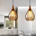 sergia-moderne-nordische-glas-pendelleuchte-verstellbar-kabel-luxus-warm-xlumina