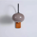 xlumina-drehbare-bauhaus-wandleuchte-kaki-glas-elegant-flexibel-modern2