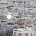 zenithglas-wandlampe-metall-glas-modern-elegant-innenbeleuchtung-gold-schwarz-xlumina4