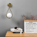 zenithglas-wandlampe-metall-glas-modern-elegant-innenbeleuchtung-gold-schwarz-xlumina5